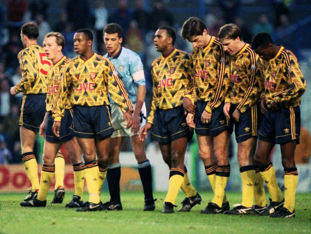 Arsenal players in the Bruised Banana away kit